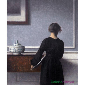 "Młoda kobieta w pokoju" - Vilhelm Hammershoi